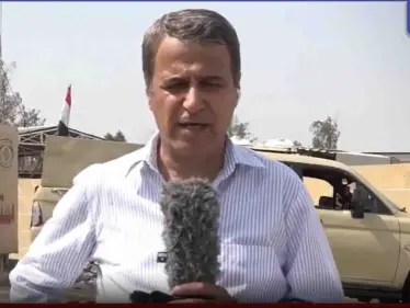 بالفيديو|| مراسل الجزيرة يصاب بالإغماء على الهواء هو ينقل أحداث حريق مستشفى ابن الخطيب ببغداد - وكالة ستيب نيوز