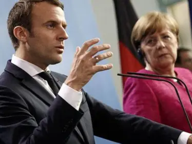 بعد فضيحتها السياسية.. ماكرون وميركل يطالبان واشنطن بهذا الأمر - وكالة ستيب نيوز