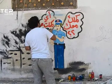 جدارية للرسام الغرافيتي عزيز أسمر عن حال السوريين في تركيا - وكالة ستيب نيوز