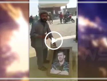 شاهد بالفيديو || أهالي دير الزور يوجّهون رسالة إلى مؤيدي بشار الأسد بتمزيق صورة شقيقه بأرجلهم - وكالة ستيب نيوز