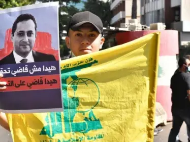 مراقب سياسي يكشف خطط خطيرة لـ "حزب الله" مع عودة القاضي بيطار إلى التحقيق - وكالة ستيب نيوز