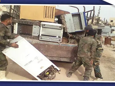 عناصر الميليشيات الإيرانية بدير الزور تسرق محال التجار.. والقيادات تغض النظر - وكالة ستيب نيوز