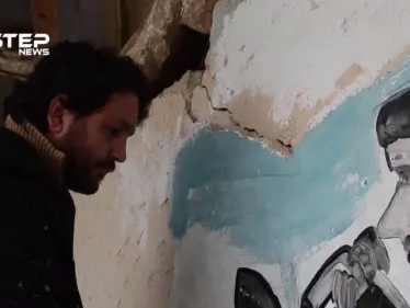 جدارية للغرافيتي "عزيز الأسمر" تعبيرًا عن أزمة الوقود التي تشهدها مناطق النظام - وكالة ستيب نيوز