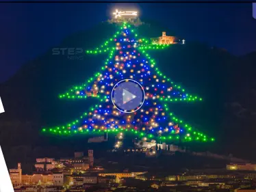 بالفيديو|| مشهد مبهر لأكبر شجرة عيد ميلاد في العالم تضيئها إيطاليا - وكالة ستيب نيوز