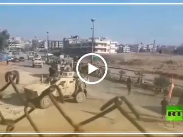 بالفيديو|| حاجز لقوات النظام السوري بالقامشلي يمنع دورية أمريكية من العبور - وكالة ستيب نيوز