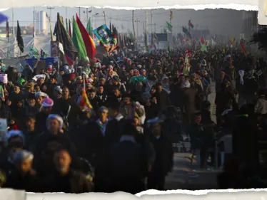 اعتداء على زوار من إيران والسعودية وإهانة أعلامهم بموكب 