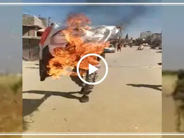 شاهد إحراق المتظاهرين لصورة اردوغان ضمن مظاهرات باب الهوى شمال ادلب - وكالة ستيب نيوز