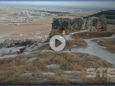 تقرير مصور|| قلعة شميميس.. قلعة عسكرية أثرية تحولت لمرصد يقصف المدنيين على يد قوات النظام السوري - وكالة ستيب نيوز