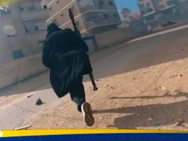 شاهد|| "بالطو القسام".. أناقة مقاتل فلسطيني في غزة تثير تفاعلاً بين النشطاء - وكالة ستيب نيوز