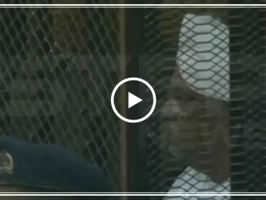 شاهد بالفيديو|| ردّة فعل الرئيس السوداني السابق "البشير" خلال محاكمته - وكالة ستيب نيوز