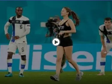 بالفيديو والصور|| فتاة حسناء بلباس مكشوف تقتحم مباراة بلجيكا وفنلندا لتروج عملة رقمية مشفرة - وكالة ستيب نيوز