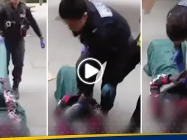 شاهد|| شرطية بريطانية تعتدي على لاجئ عربي بالضرب وتركله في بطنه وسط الشارع - وكالة ستيب نيوز