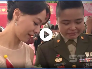 بالفيديو|| جنديتان مثليتان تدخلان القفص الذهبي في حفل زفافٍ عسكري جماعي بقاعدة عسكرية - وكالة ستيب نيوز