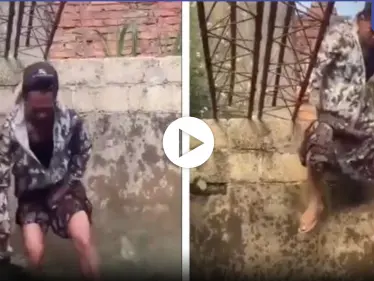 بالفيديو|| آسيوي ينزل في بركة مليئة بالتماسيح.. ويحاول الإمساك بهم - وكالة ستيب نيوز