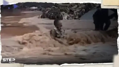 بالفيديو|| شاب ليبي يصارع للبقاء حيّاً وسط سيول جارفة خلال "كارثة درنة"