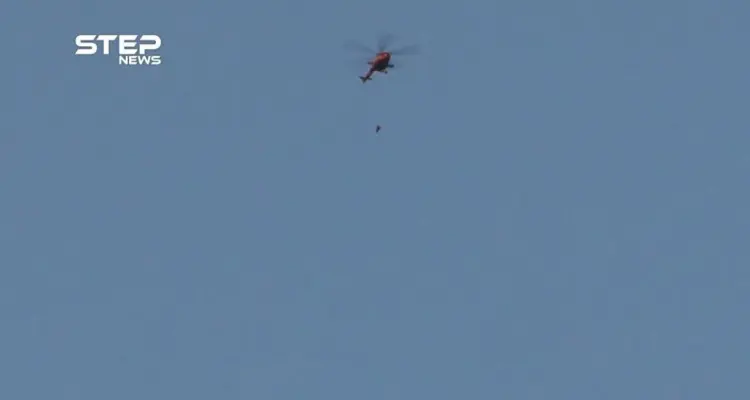 الطيران المروحي يستهدف قرية حيش في ريف إدلب الجنوبي بالبراميل المتفجرة: أخبار