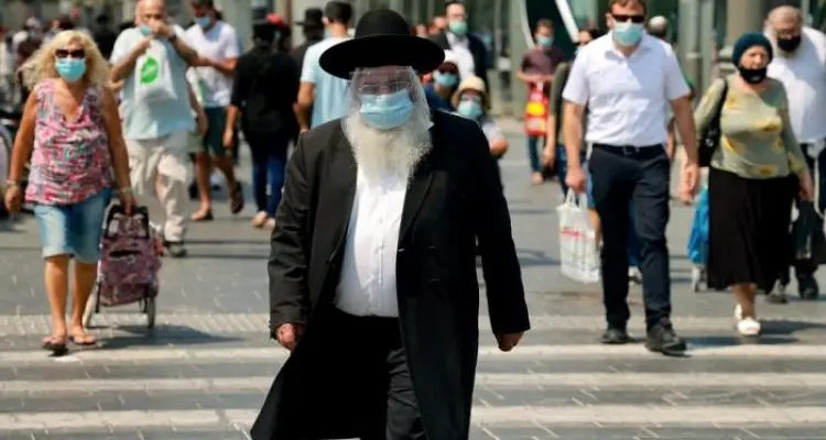 إسرائيل تعفي سكانها من ارتداء الكمامات في الأماكن المفتوحة لأول مرة منذ عام: أخبار