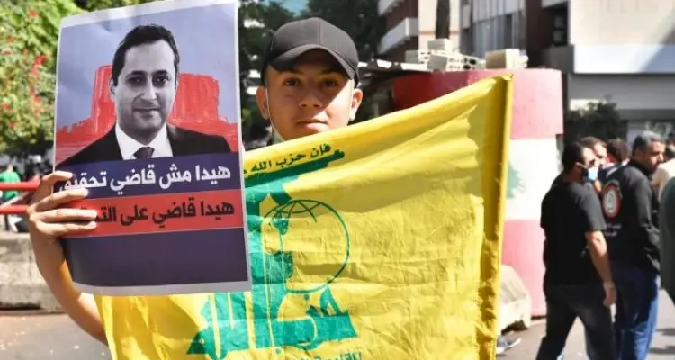 مراقب سياسي يكشف خطط خطيرة لـ "حزب الله" مع عودة القاضي بيطار إلى التحقيق: أخبار