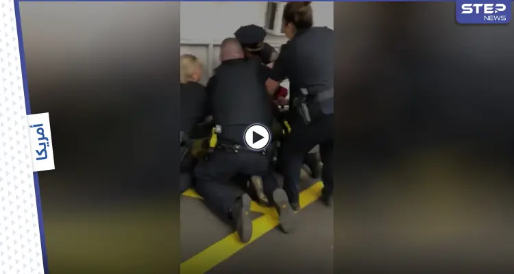 بالفيديو|| 5 عناصر من الشرطة الأمريكية تهاجم شاب ملتحي وهو يهتف الله أكبر: أخبار