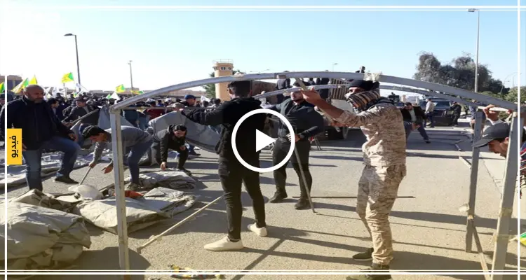 بالفيديو || قائد ميليشيا عراقية يقود اقتحام سفارة واشنطن ببغداد .. وترامب يتهم إيران: أخبار