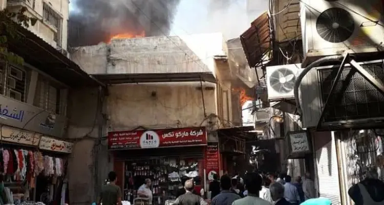 بالفيديو|| حريق ضخم في سوق الحريقة وسط دمشق يوقع قتيل وحالات اختناق: أخبار
