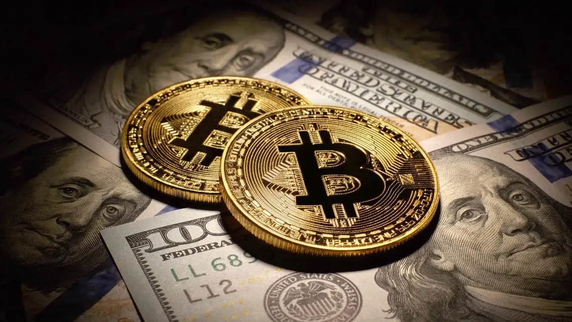 محطمةً الأرقام القياسية.. البيتكوين تتجاوز عتبة 60 ألف دولار: العملة الرقمية