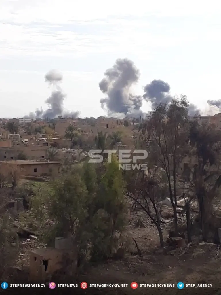 تصاعد الدخان نتيجة القصف على مدينة هجين شرق دير الزور: عدسة ستيب